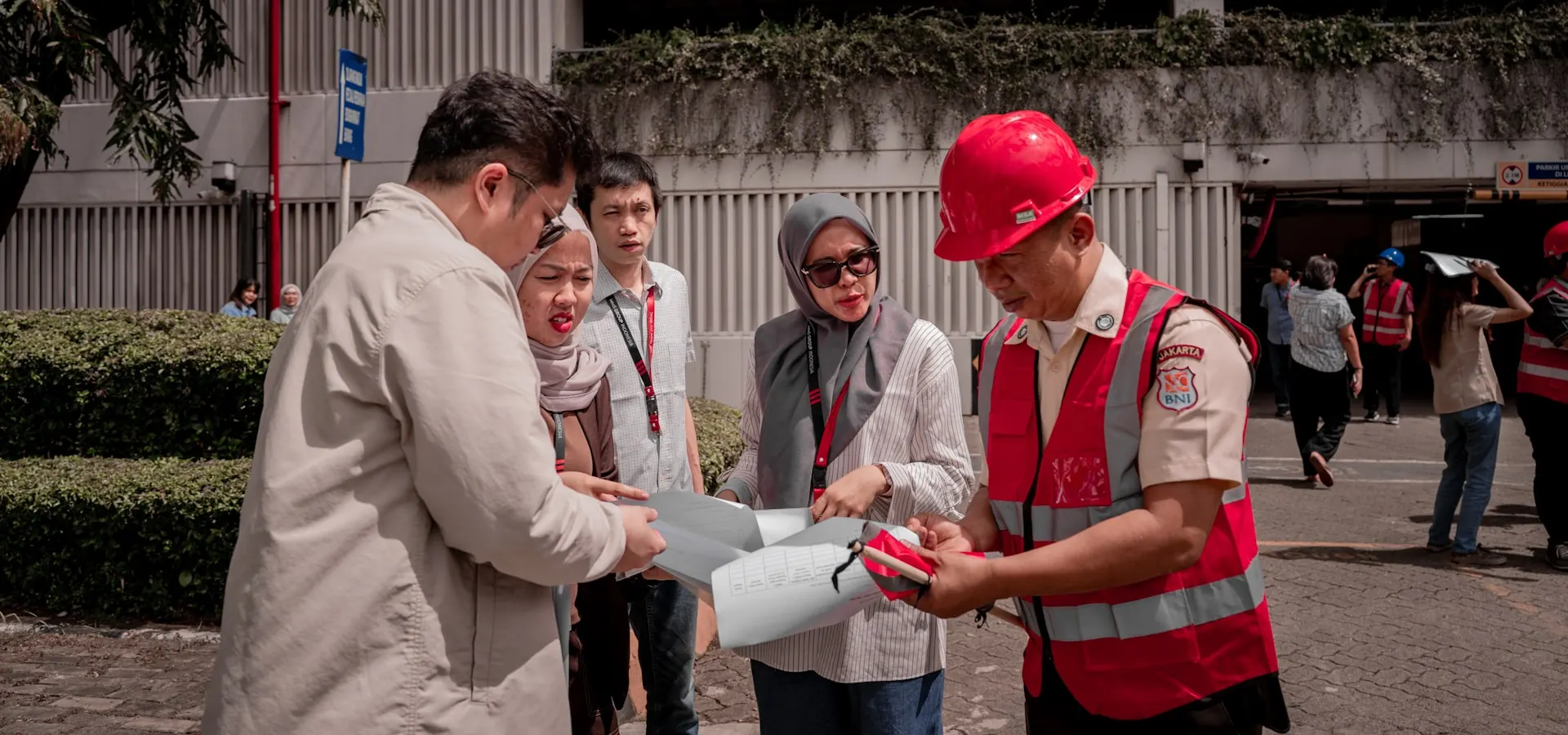 A construction team reviewing site plans together