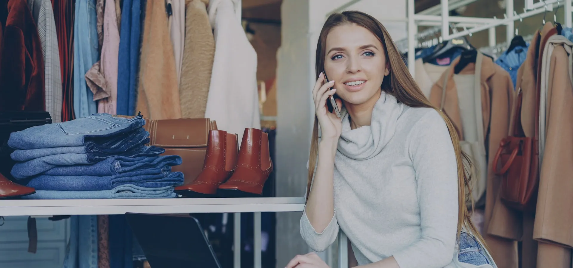 An online store owner managing orders on a laptop