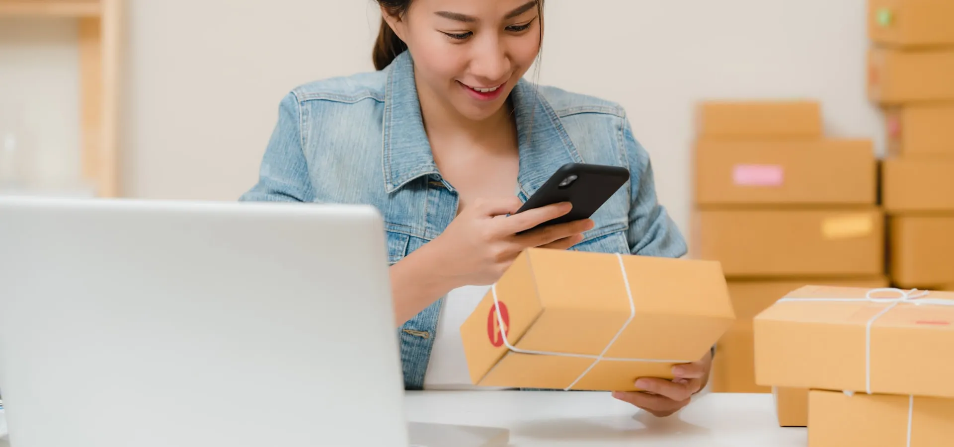 A small business owner preparing an online order for shipping