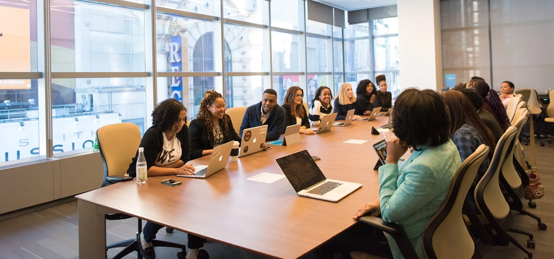 A diverse business team meeting in a modern high-rise office